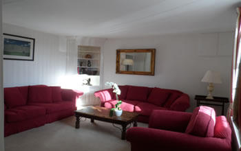 Enford House self catering holiday cottage has a spacious sitting room with 2 3 seater sofas, armchair, tv, dvd, wifi