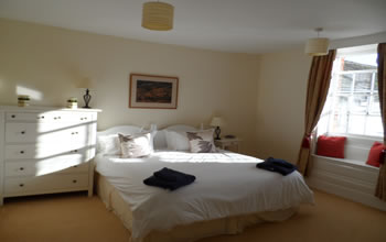Enford House cottage twin bedroom on the ground floor so easily accessible and with beautiful views of the walled garden